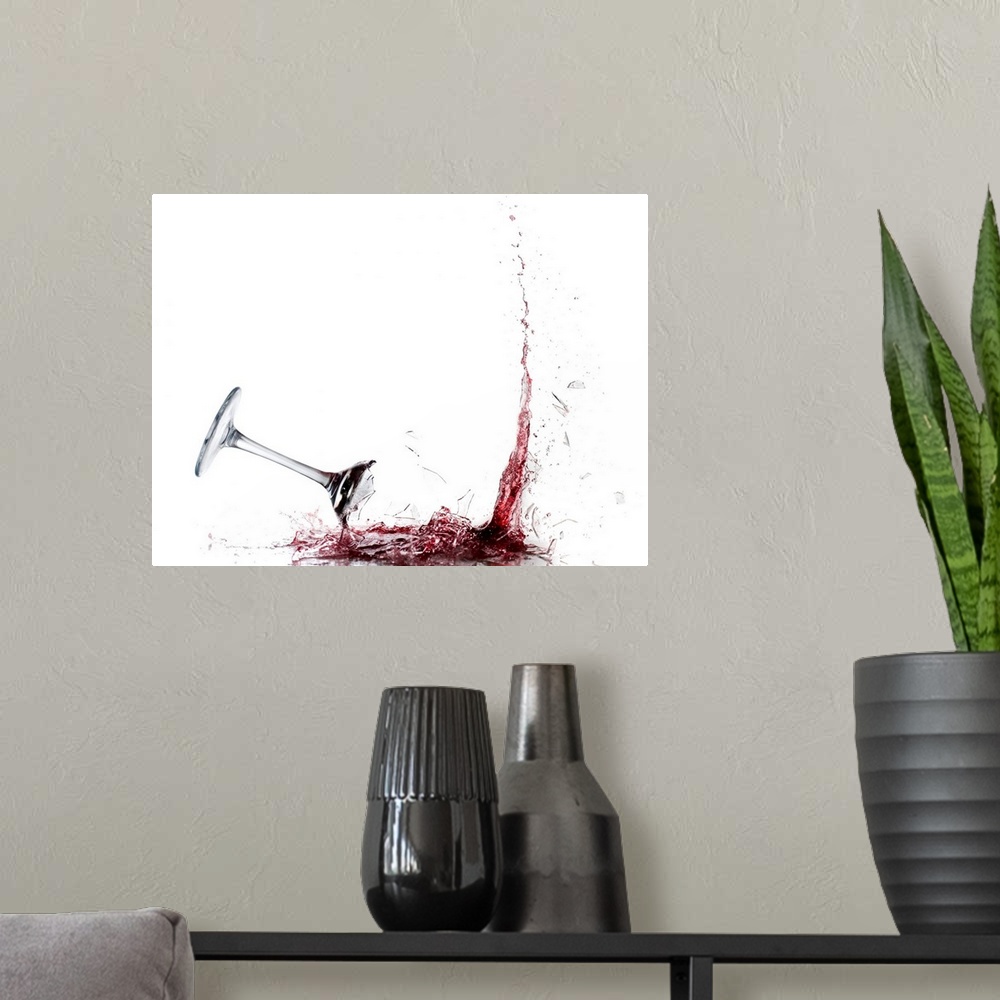 A modern room featuring Giant photograph displays a piece of stemware filled with vino as it crashes into the ground and ...