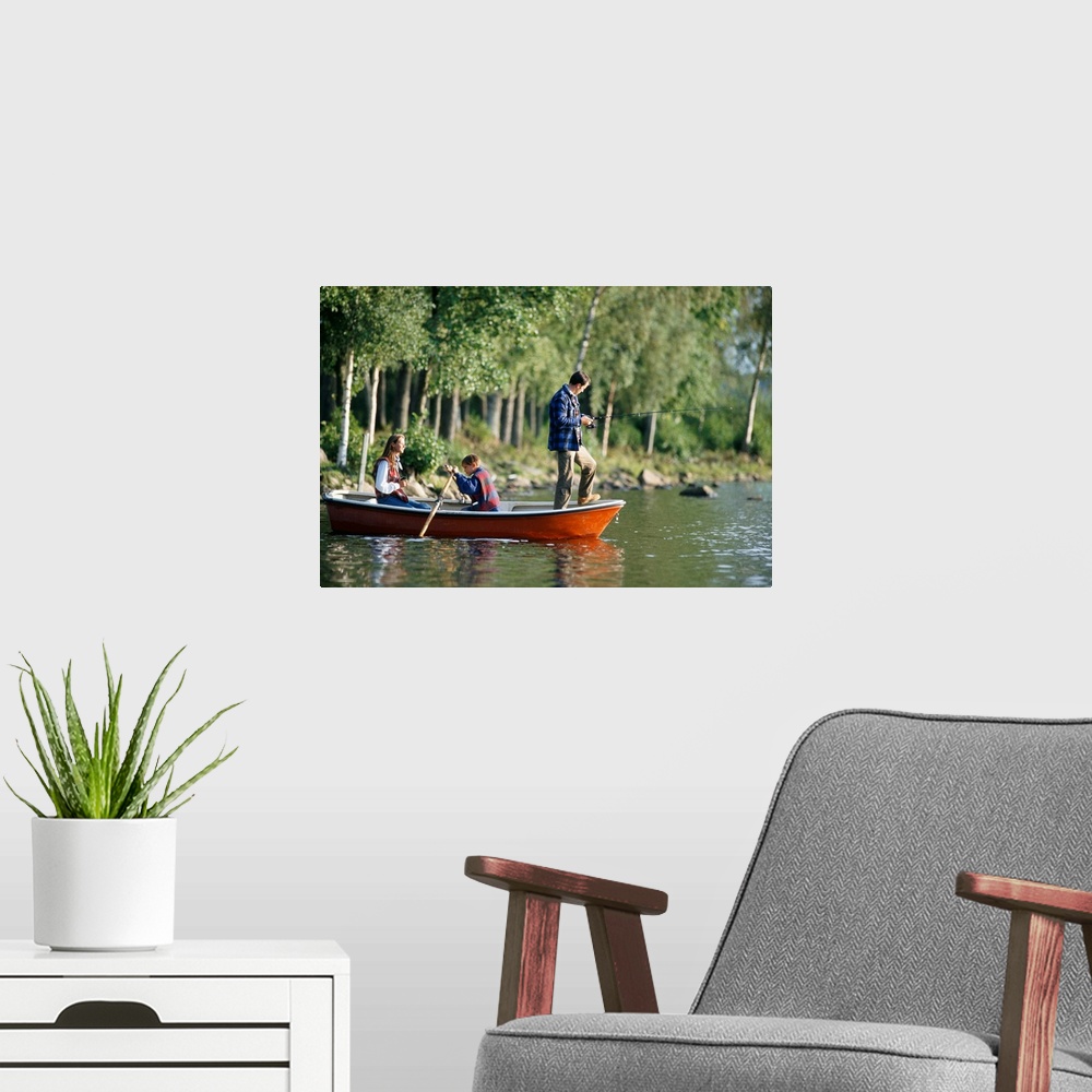 A modern room featuring Family fishing from boat