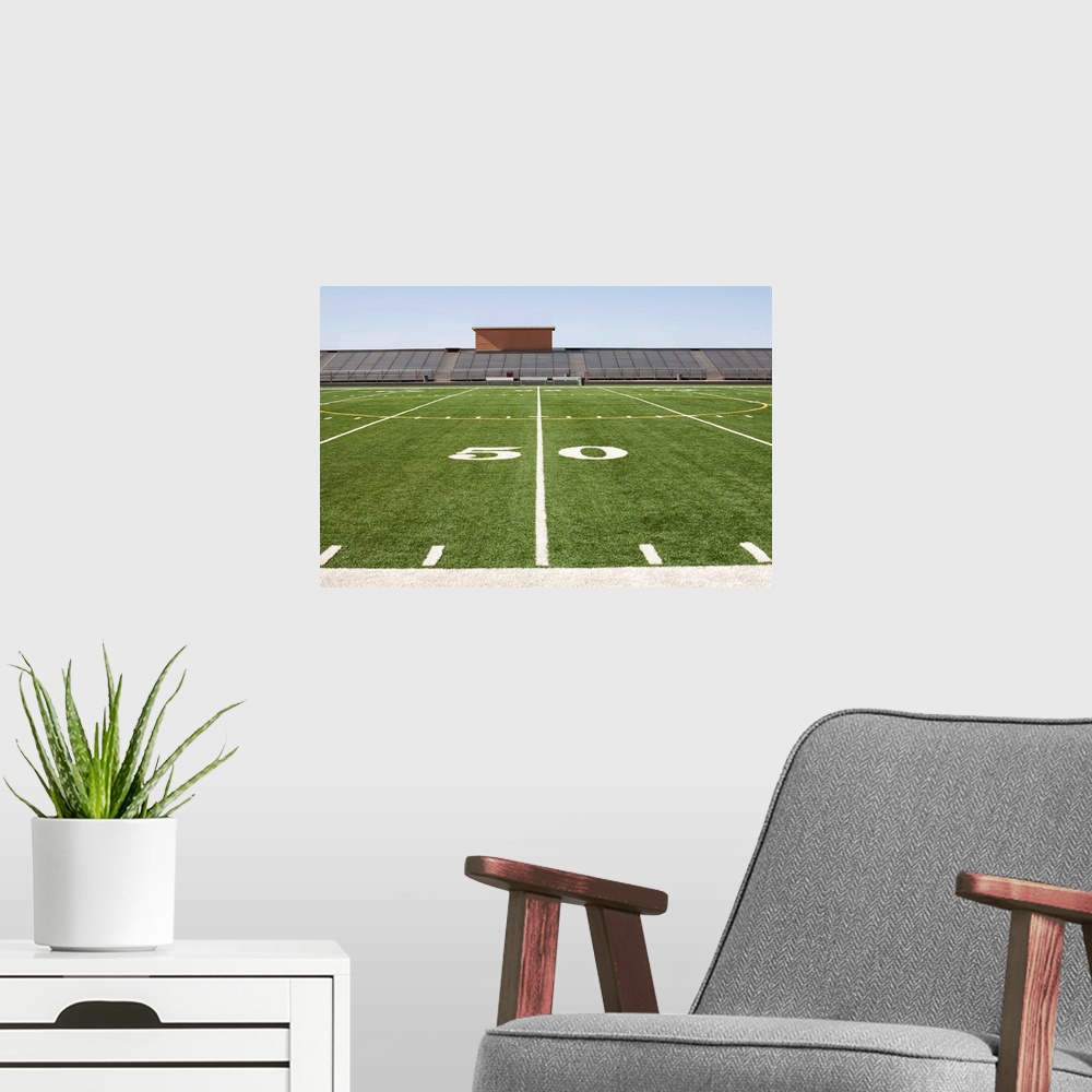 A modern room featuring Football field and stadium