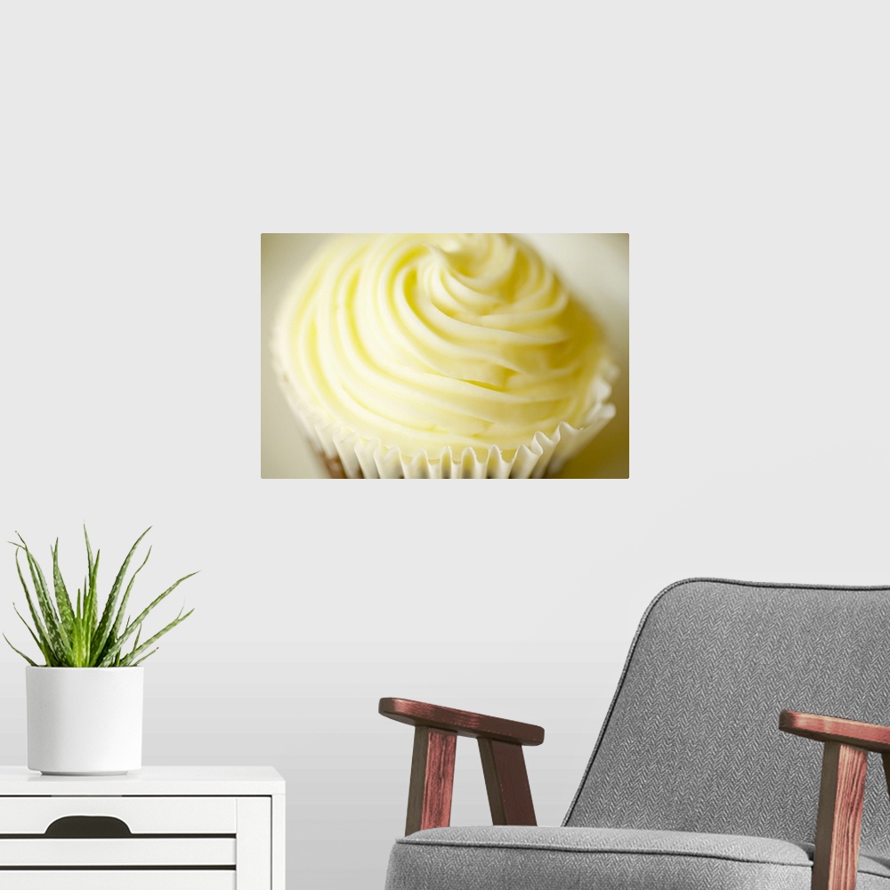 A modern room featuring Frosted cupcake