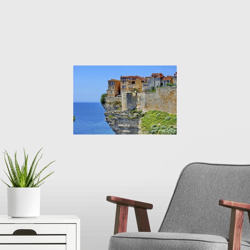 A modern room featuring Houses at Bonifacio in Corsica is built on cliff.