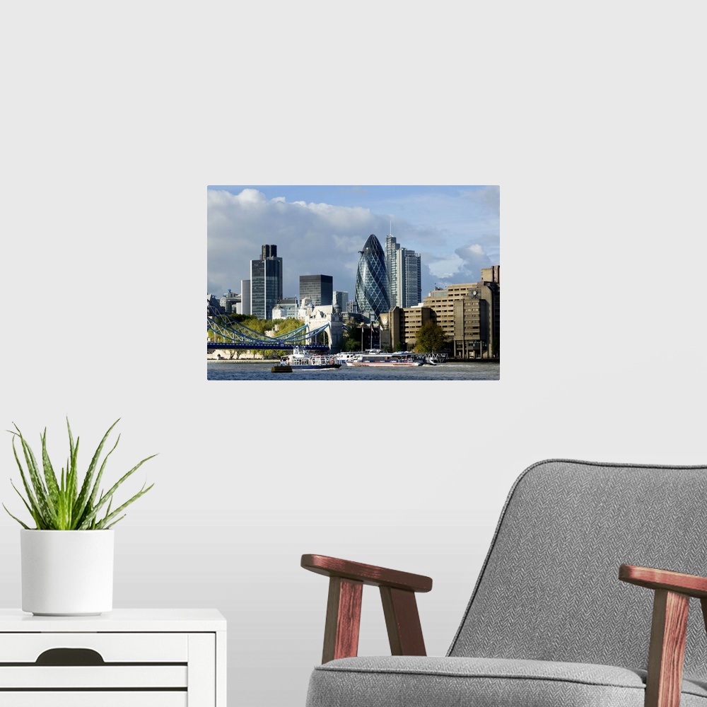 A modern room featuring Cityscape of City of London financial center acts as a backdrop for River Thames. This 2010 City ...