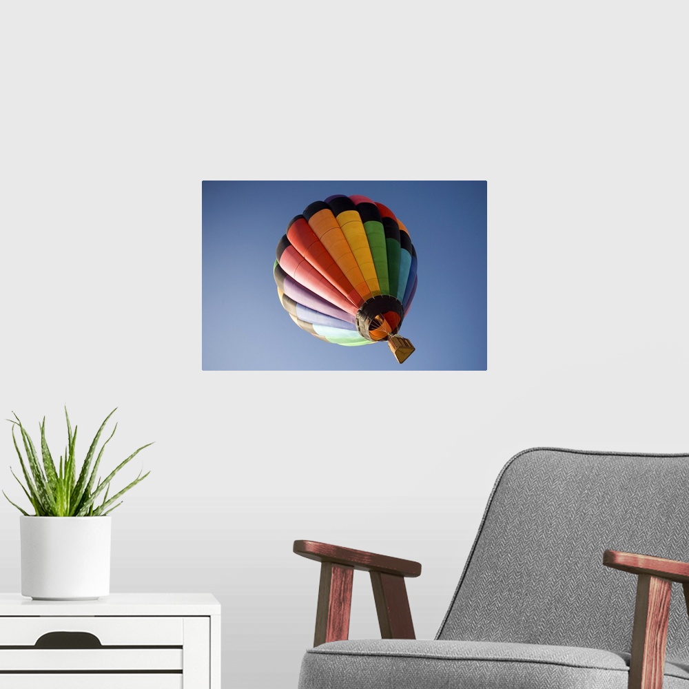 A modern room featuring Low angle view of a hot air balloon in blue sky, California, USA