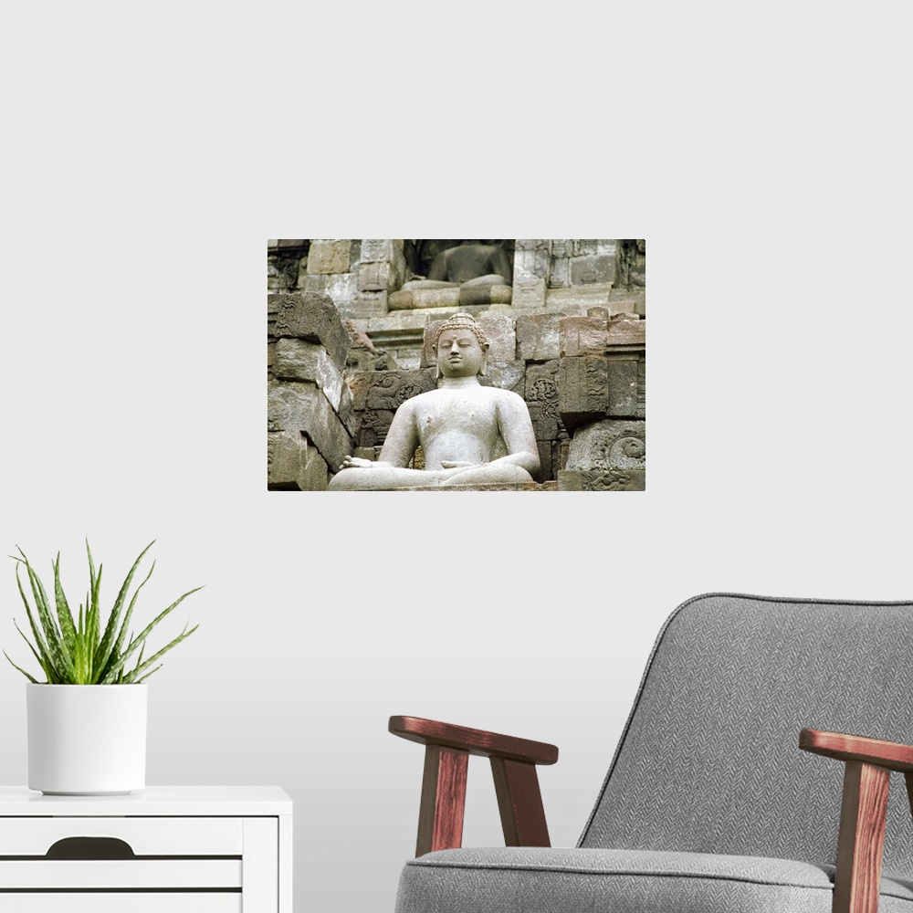 A modern room featuring Low angle view of the Statue of Buddha, Borobudur Temle, Java, Indonesia