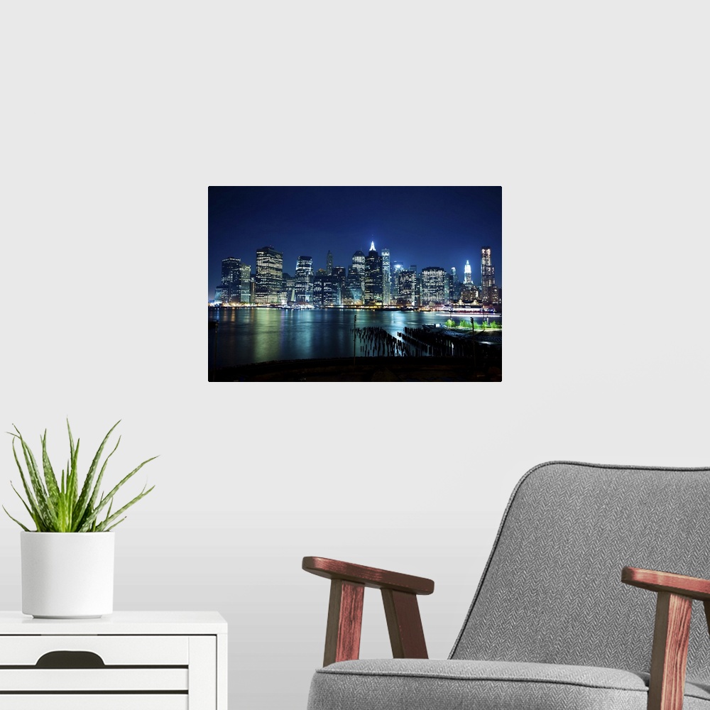 A modern room featuring Looking across the East River at Lower Manhattan from Brooklyn