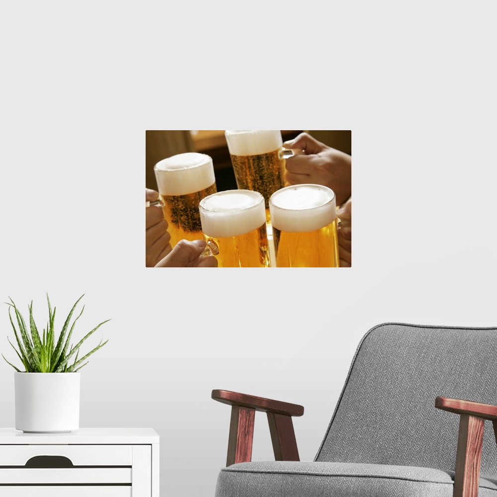 A modern room featuring Making a toast with beer