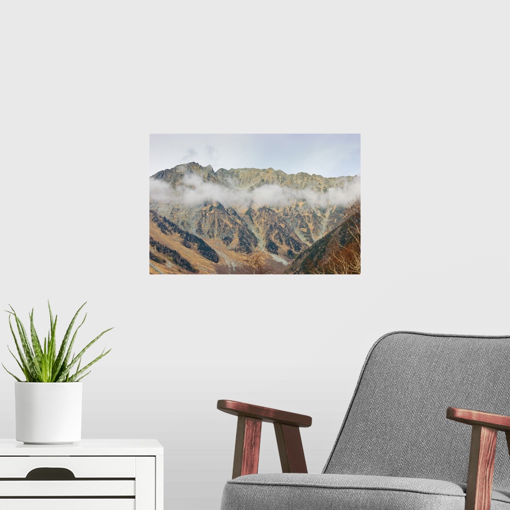 A modern room featuring Mountains with fog in Japan.