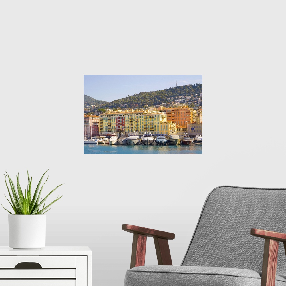 A modern room featuring Nice Harbour, Cote d'Azur with ship and building in France.