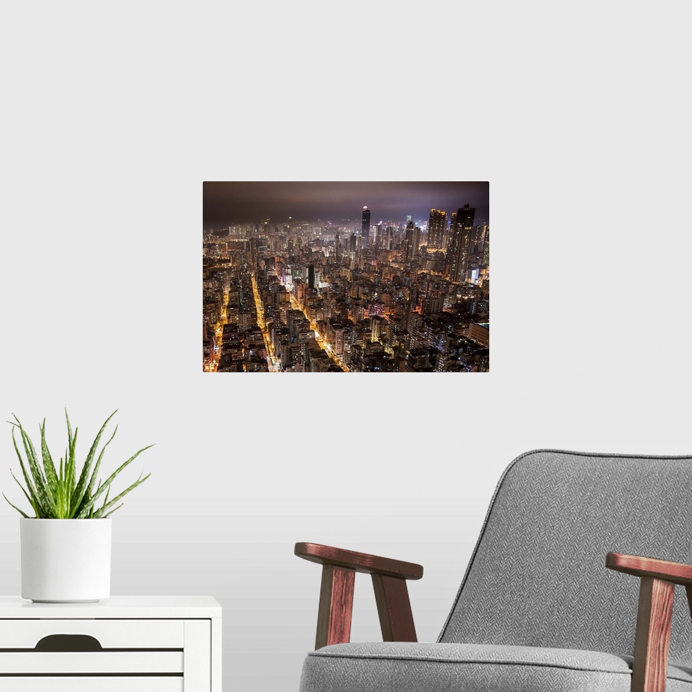A modern room featuring Night view of Kowloon, Hong Kong.