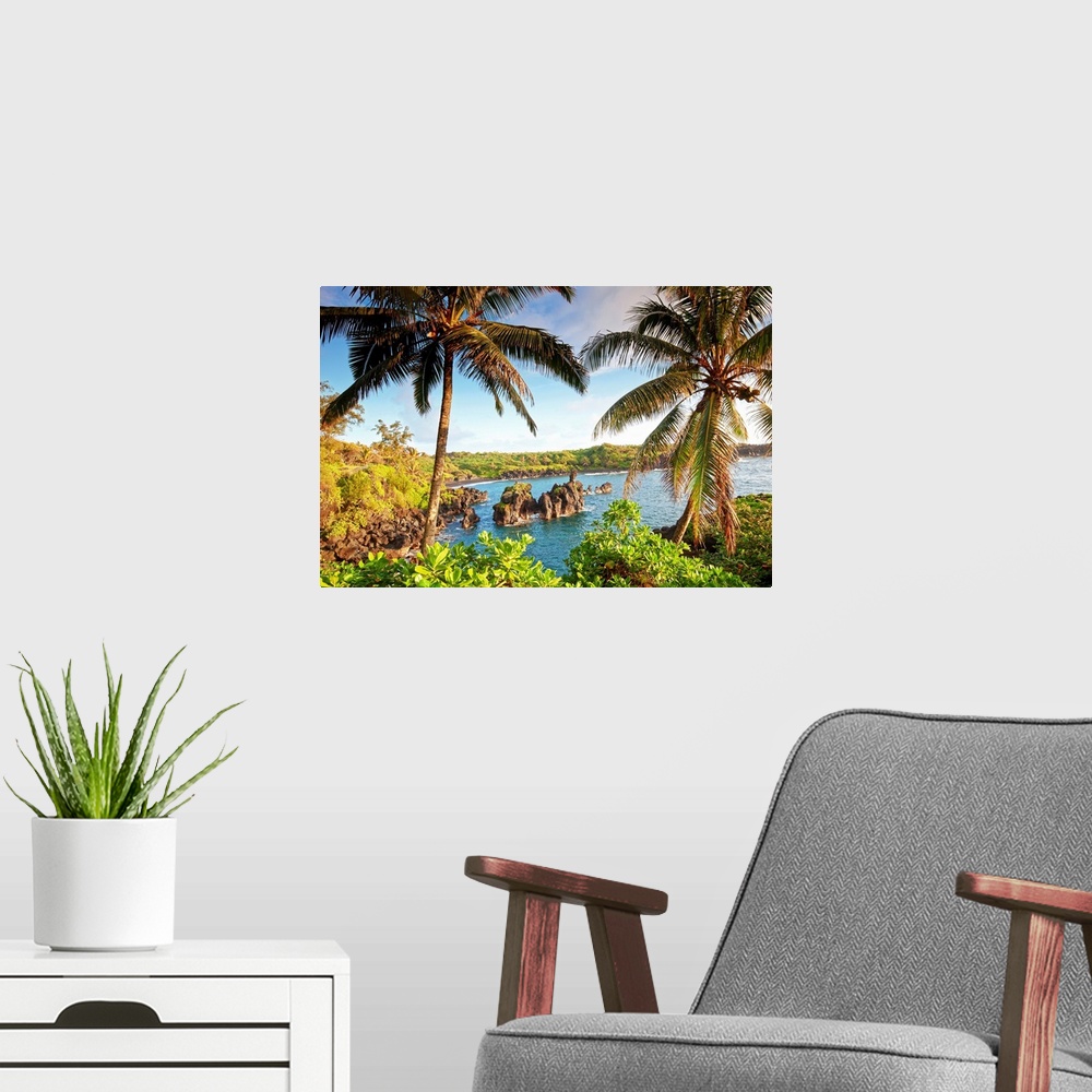 A modern room featuring Landscape photograph of two large palm trees swaying over the coastline in Maui, Hawaii.  Large r...