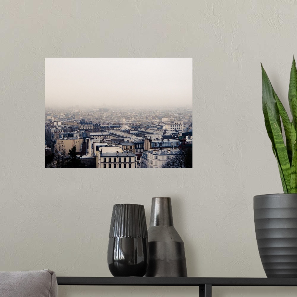 A modern room featuring Paris cityscape.