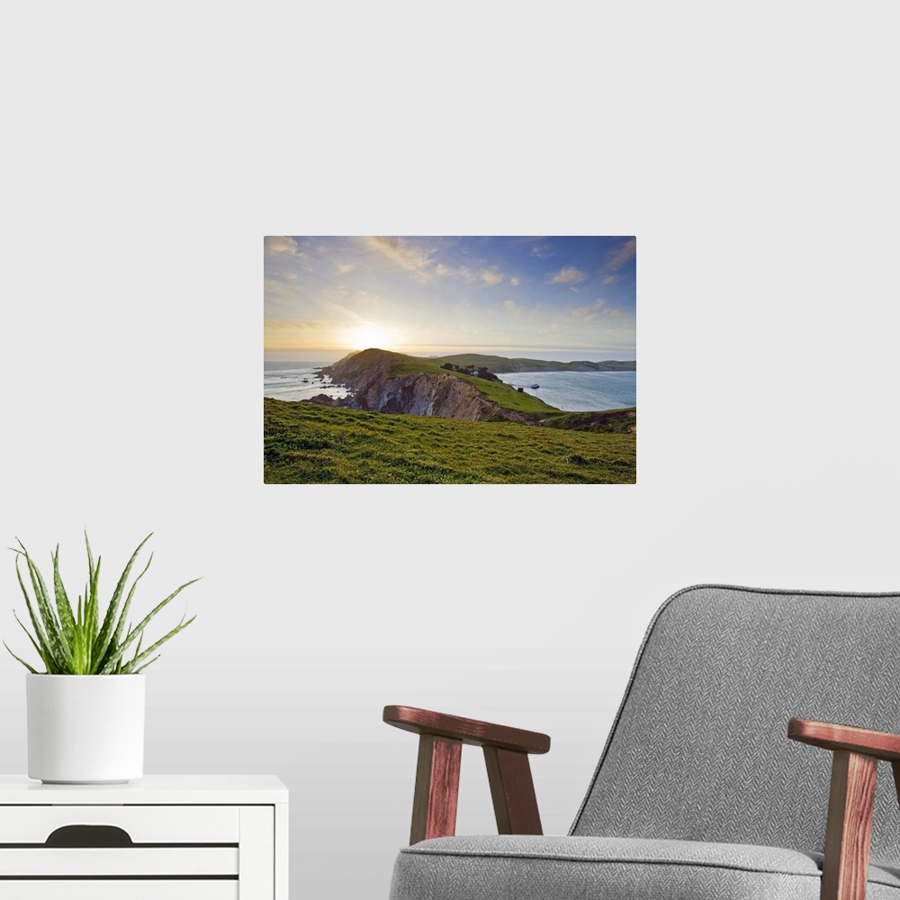 A modern room featuring Point Reyes National Seashore at sunset on the northern California coast, USA.