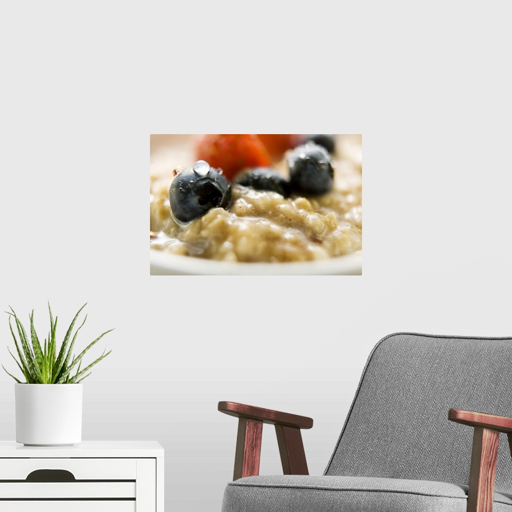 A modern room featuring Porridge with berries, close-up