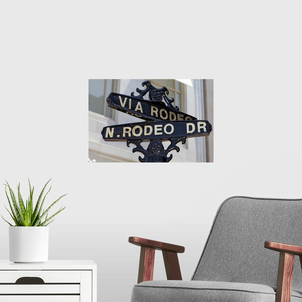 A modern room featuring Rodeo Drive, Beverly Hills sign
