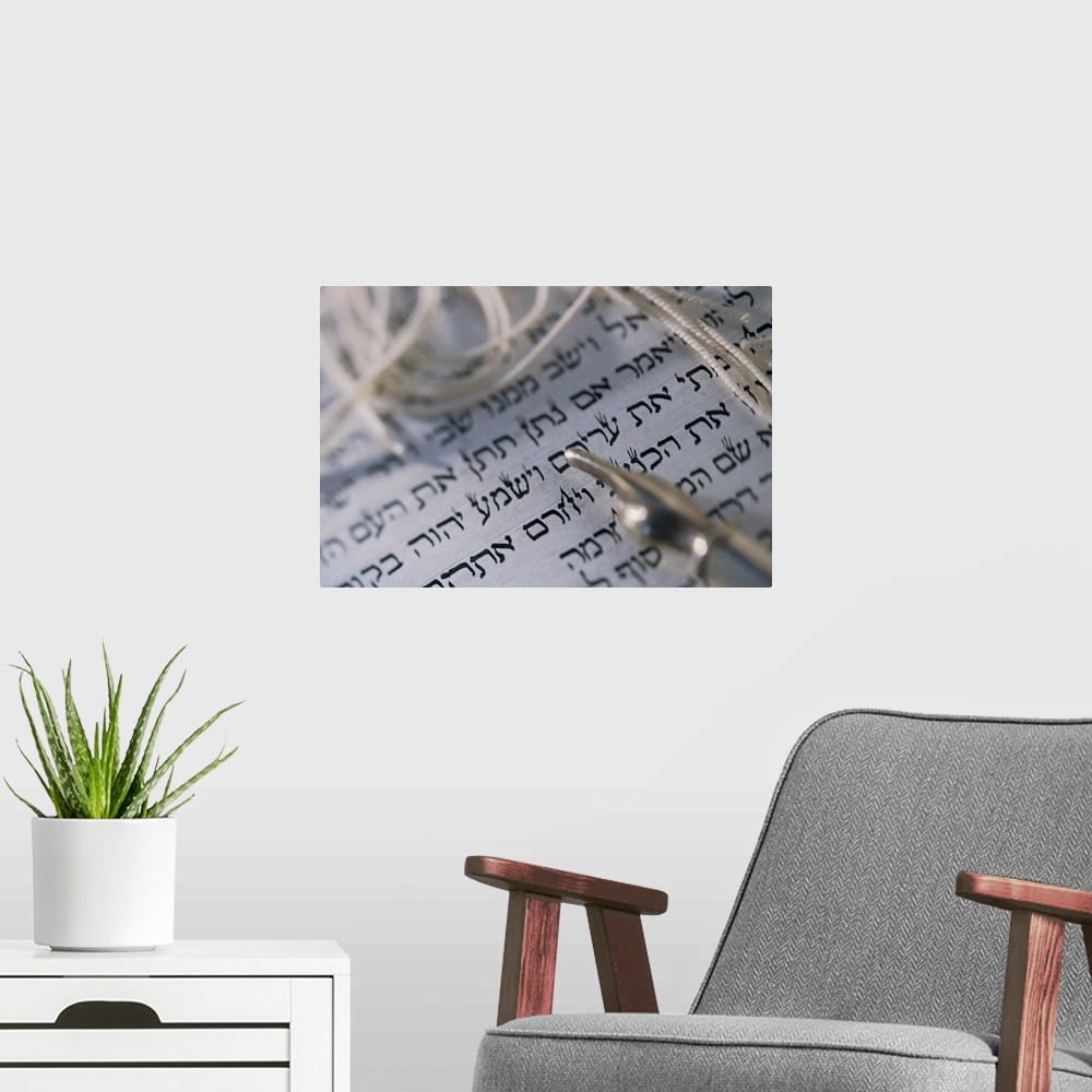 A modern room featuring Script of the Torah with yad