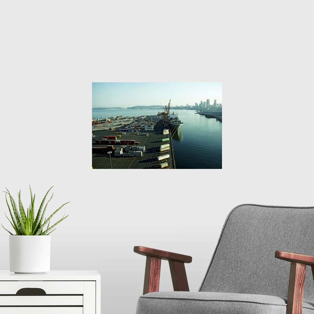 A modern room featuring Seattle Docks waterfront; container shipping, elevated view