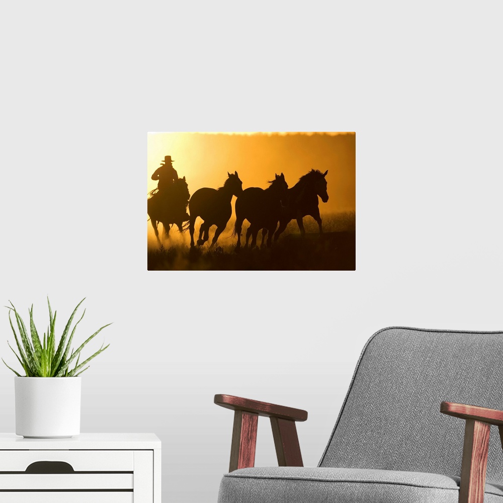 A modern room featuring Silhouette Of Cowboy Herding Horses