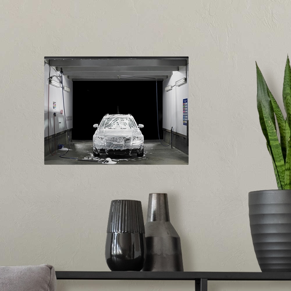A modern room featuring Soapy car at self service car wash