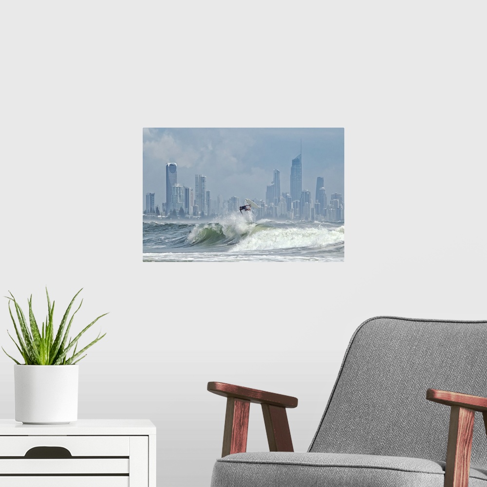 A modern room featuring Surfer at burleigh heads with skyline of Surfers Paradise in background.