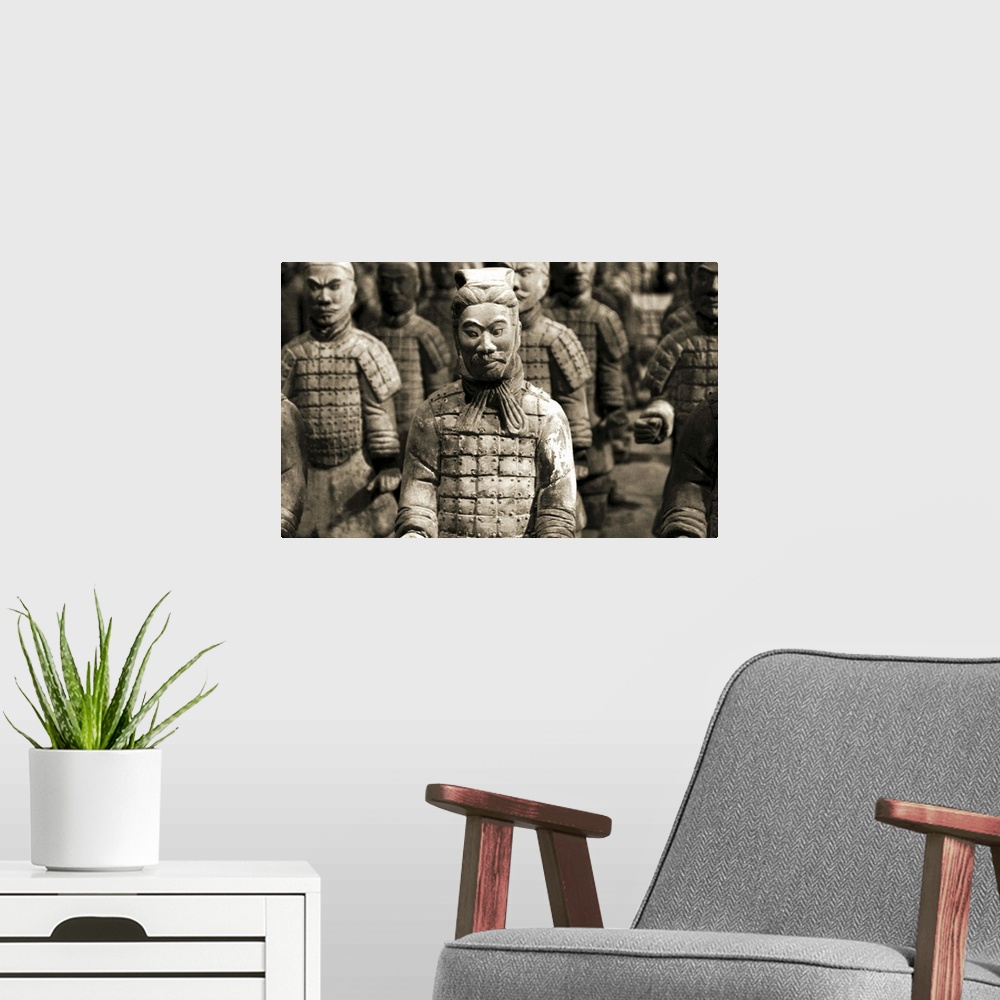 A modern room featuring Terracotta warriors stand at attention in this representation of the Terracotta Army in  Lintong ...
