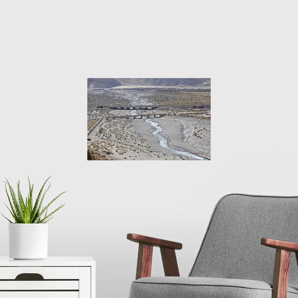 A modern room featuring The Whitewater River flows under the interstate and through the wind farms outside of Palm Spring...