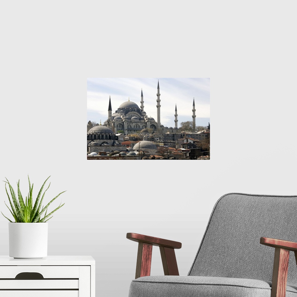 A modern room featuring The Yeni Mosque or New Mosque in Istanbul. It is an Ottoman imperial mosque located in the Eminon...