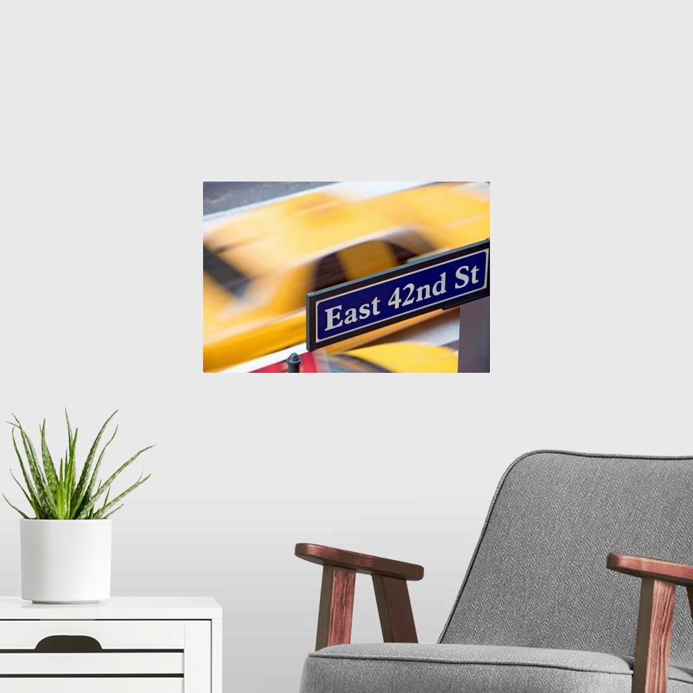 A modern room featuring USA, New York City, Manhattan, Road direction sign on 42nd Street