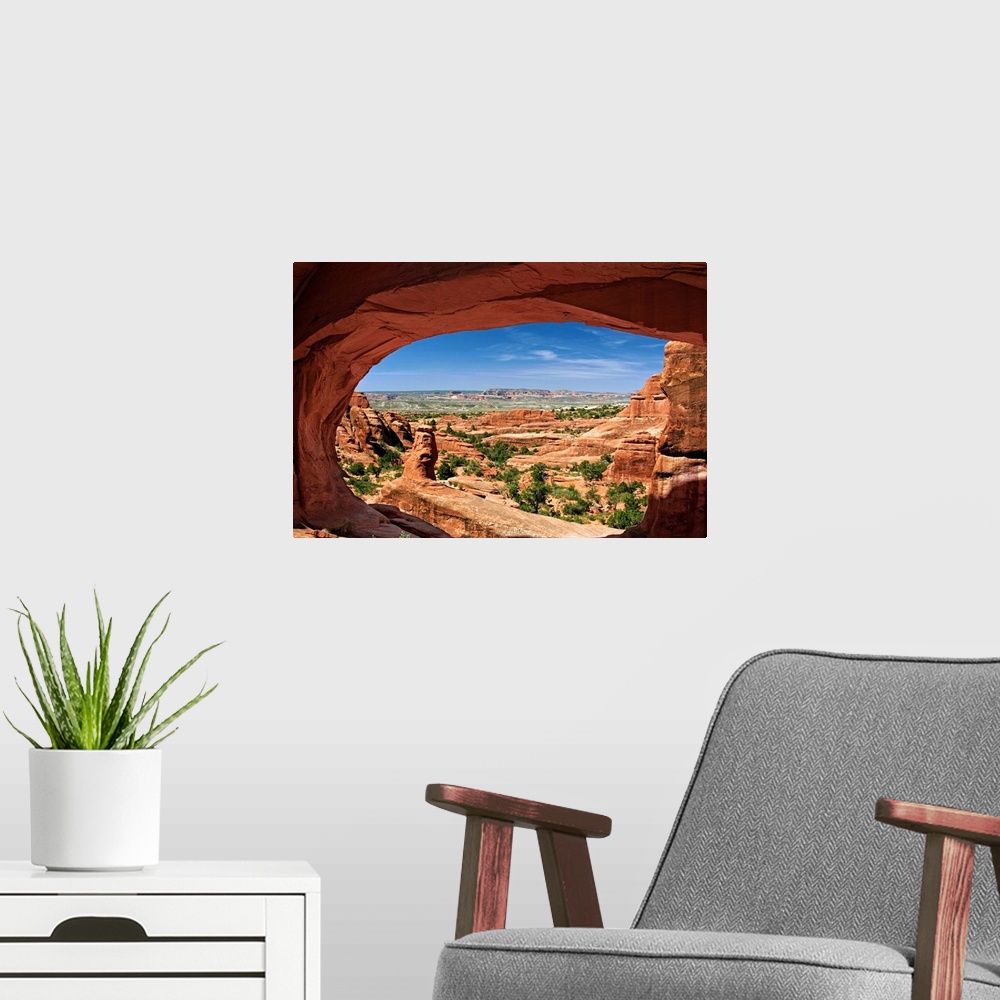 A modern room featuring View of Arches National Park looking through Tower Arch.