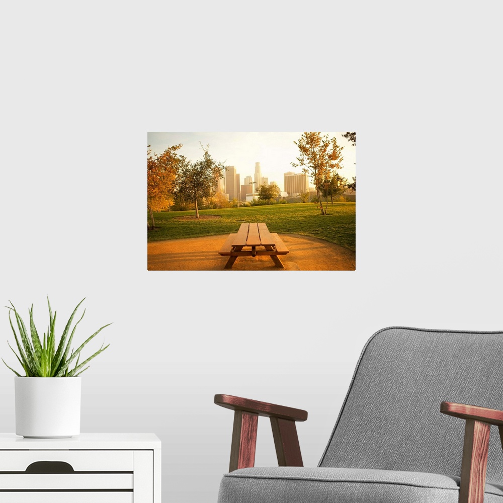 A modern room featuring View of downtown from picnic in urban park
