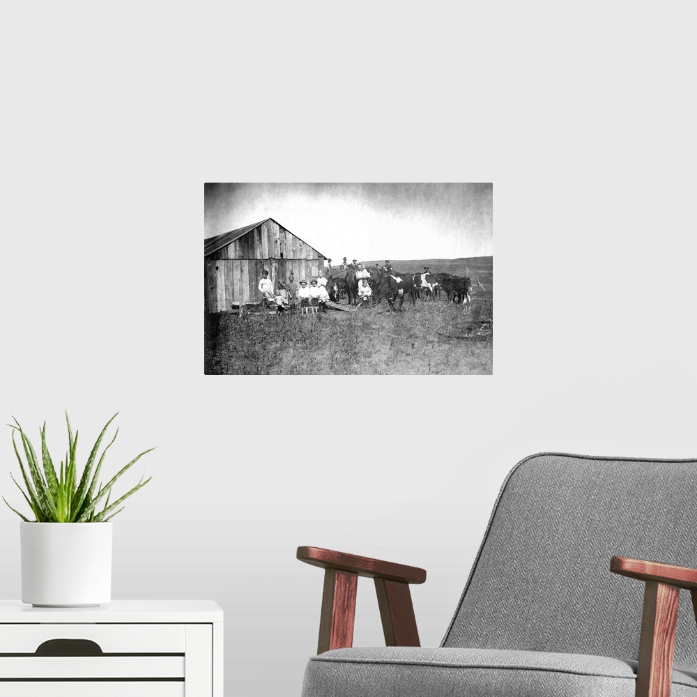 A modern room featuring Vintage image of people and livestock on farm