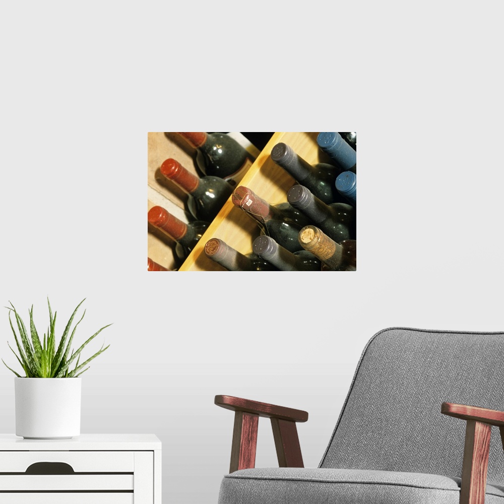 A modern room featuring Wine bottles in rack
