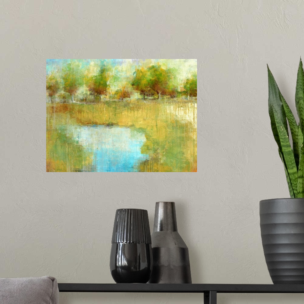 A modern room featuring Large, landscape painting of a small pond surrounded by a green landscape and a line of trees in ...