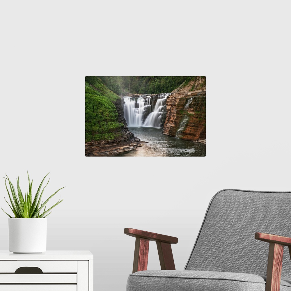 A modern room featuring The Upper Falls of the Genesee River is the first of many amazing views just inside the south ent...