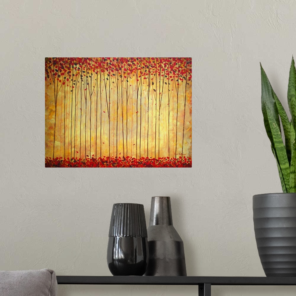 A modern room featuring Contemporary painting of a forest with warm hues, tall, thin trees with red leaves and a golden b...