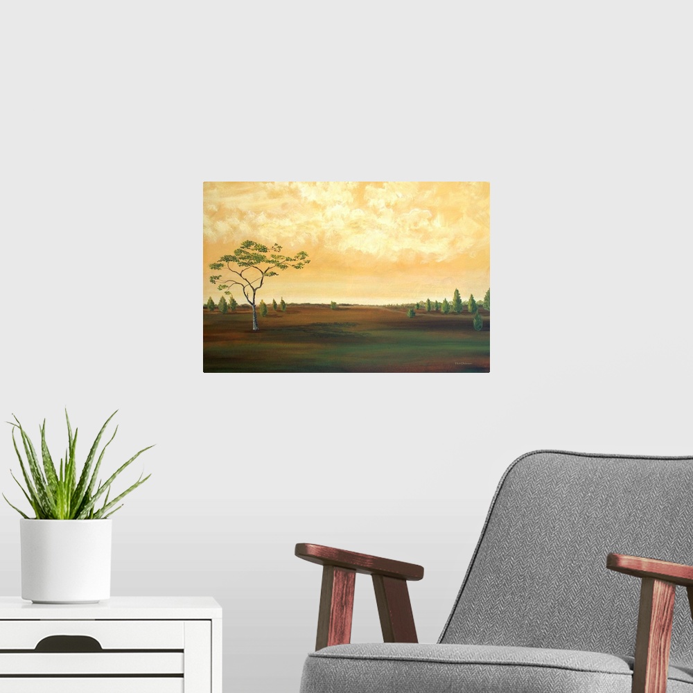 A modern room featuring Contemporary landscape painting of a countryside with a few trees and a golden sky.