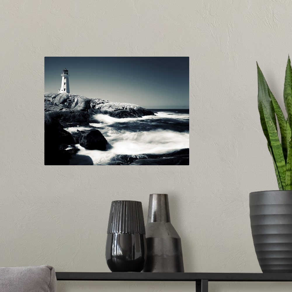 A modern room featuring A black and white image of Peggy's Cove Lighthouse in Nova Scotia, Canada.