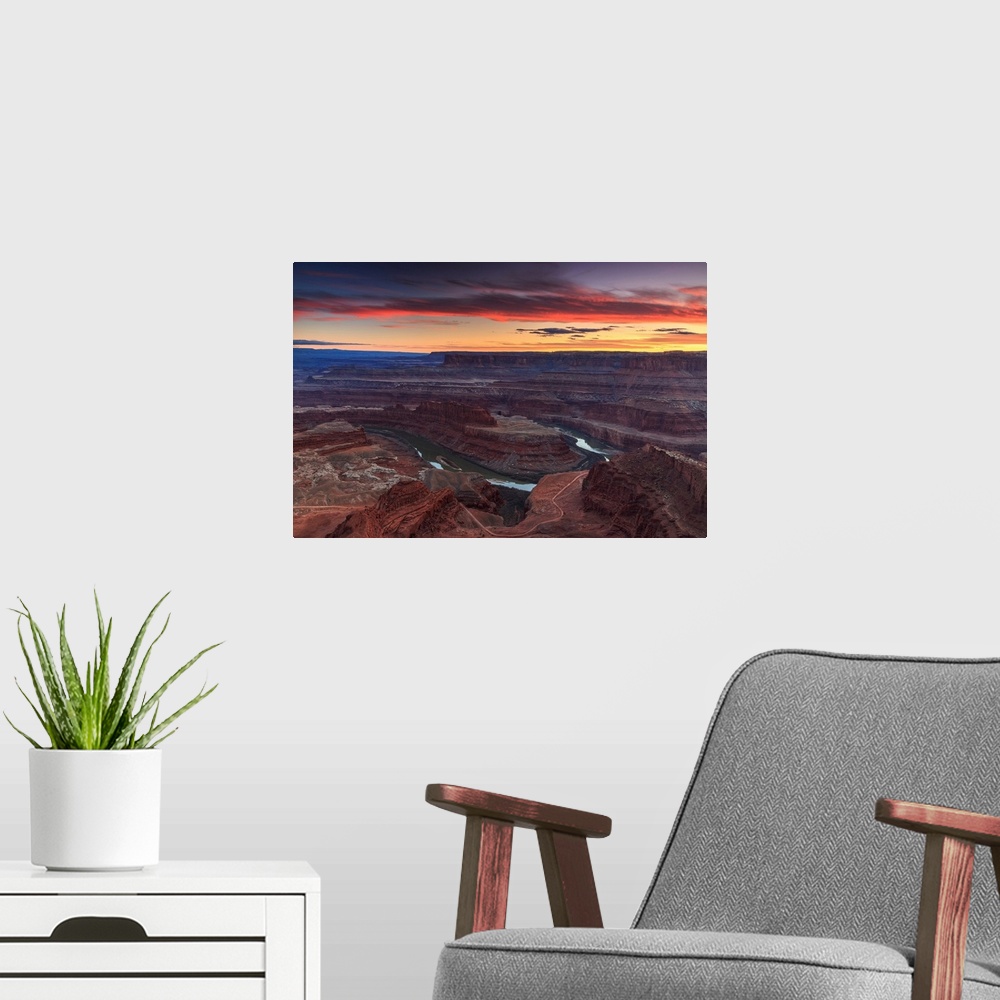 A modern room featuring Photograph of the sunset at Dead Horse Point State Park in Moab, Utah.