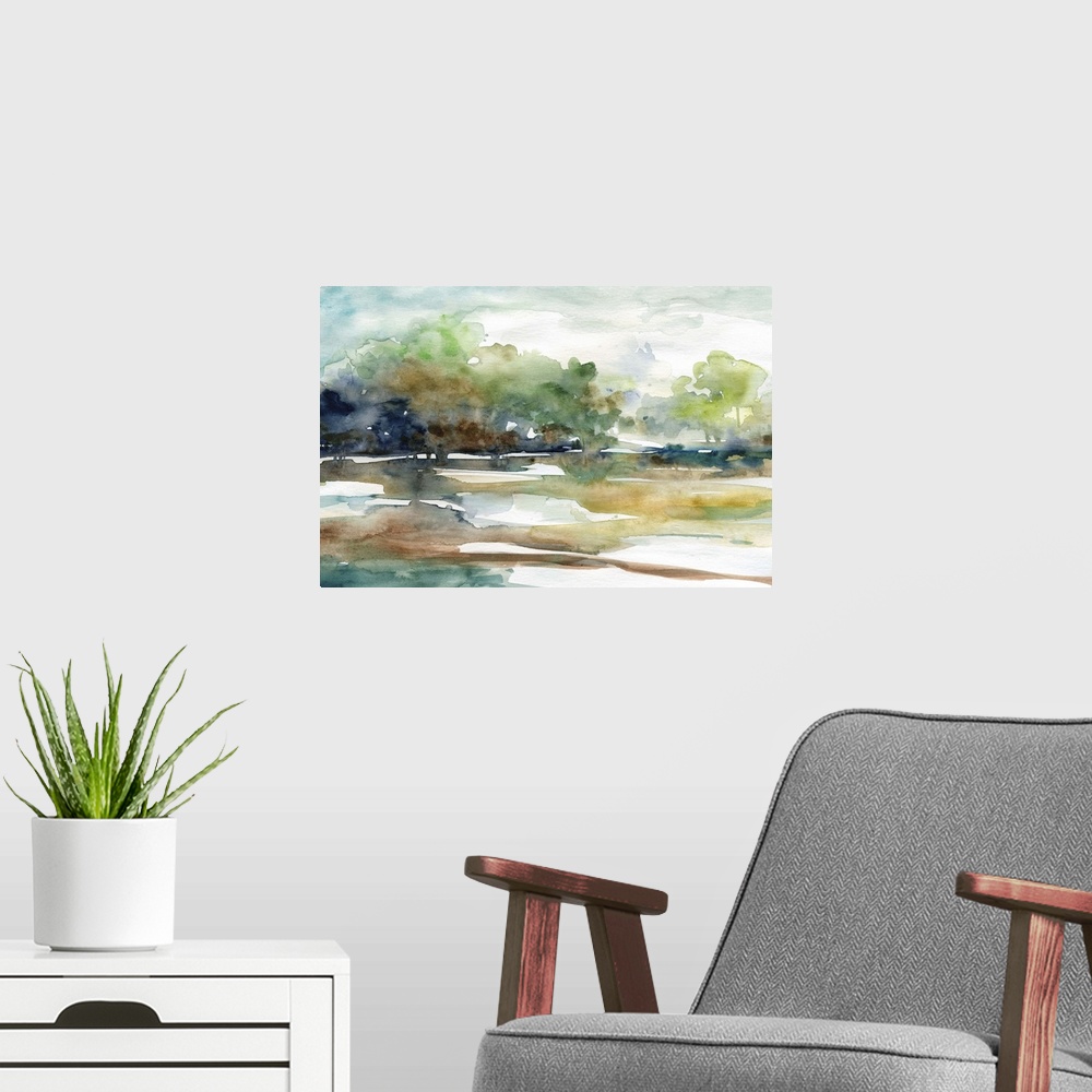 A modern room featuring Fine art watercolor painting of a tree line in blues, green and gray by Elizabeth Franklin.