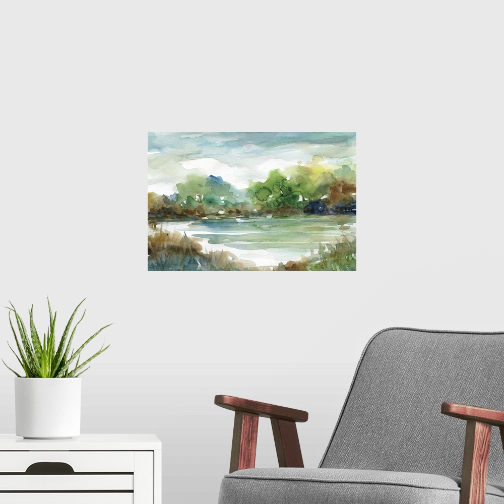 A modern room featuring Fine art watercolor painting of a tree line in blues, green and gray by Elizabeth Franklin.