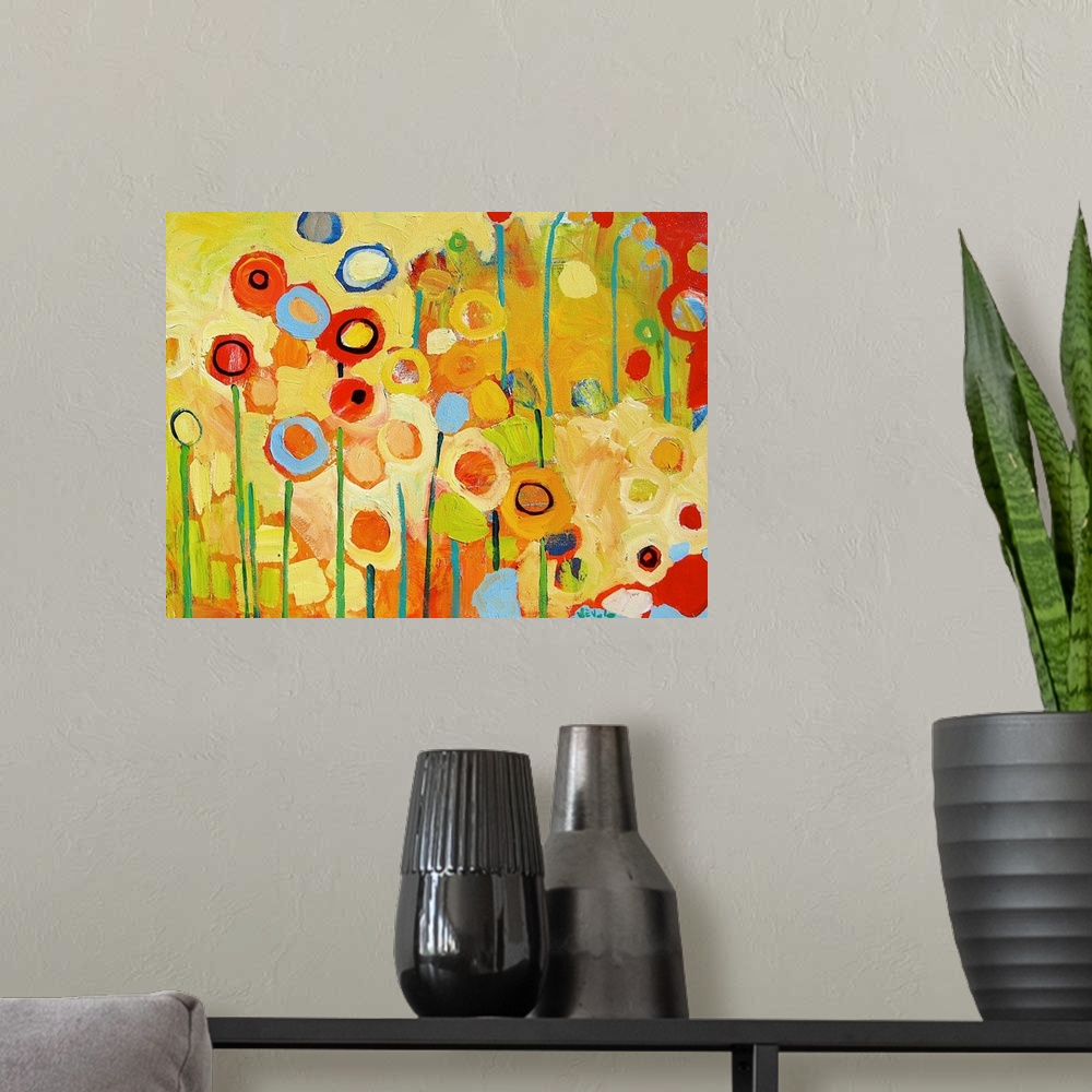 A modern room featuring An abstract still life of colorful circles and lines representing flowers and stems.