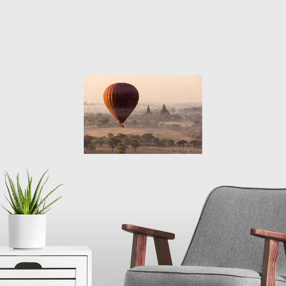 A modern room featuring A hot-air balloon flying over pagodas in Bagan, Myanmar