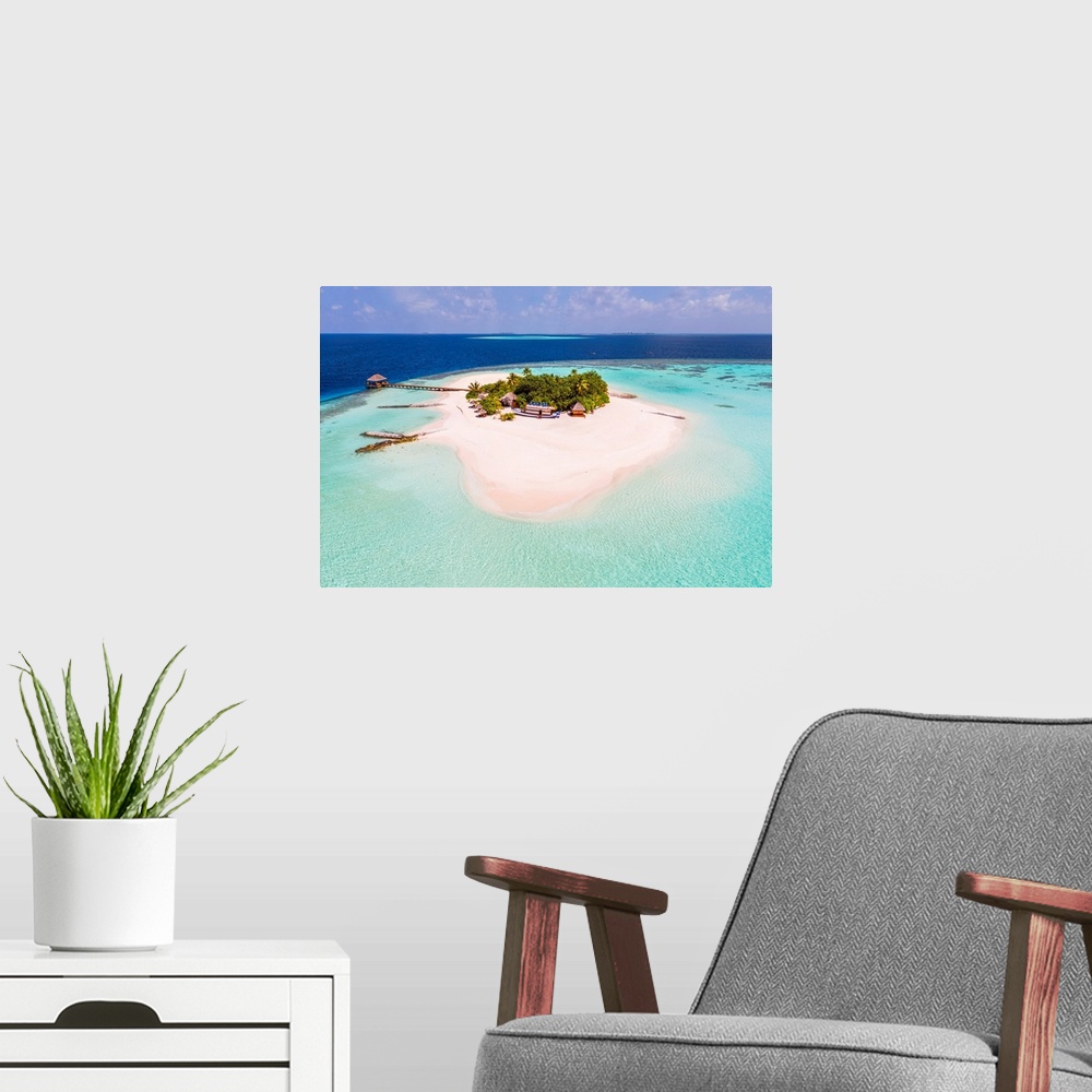 A modern room featuring Aerial Drone View Of A Tropical Island, Maldives