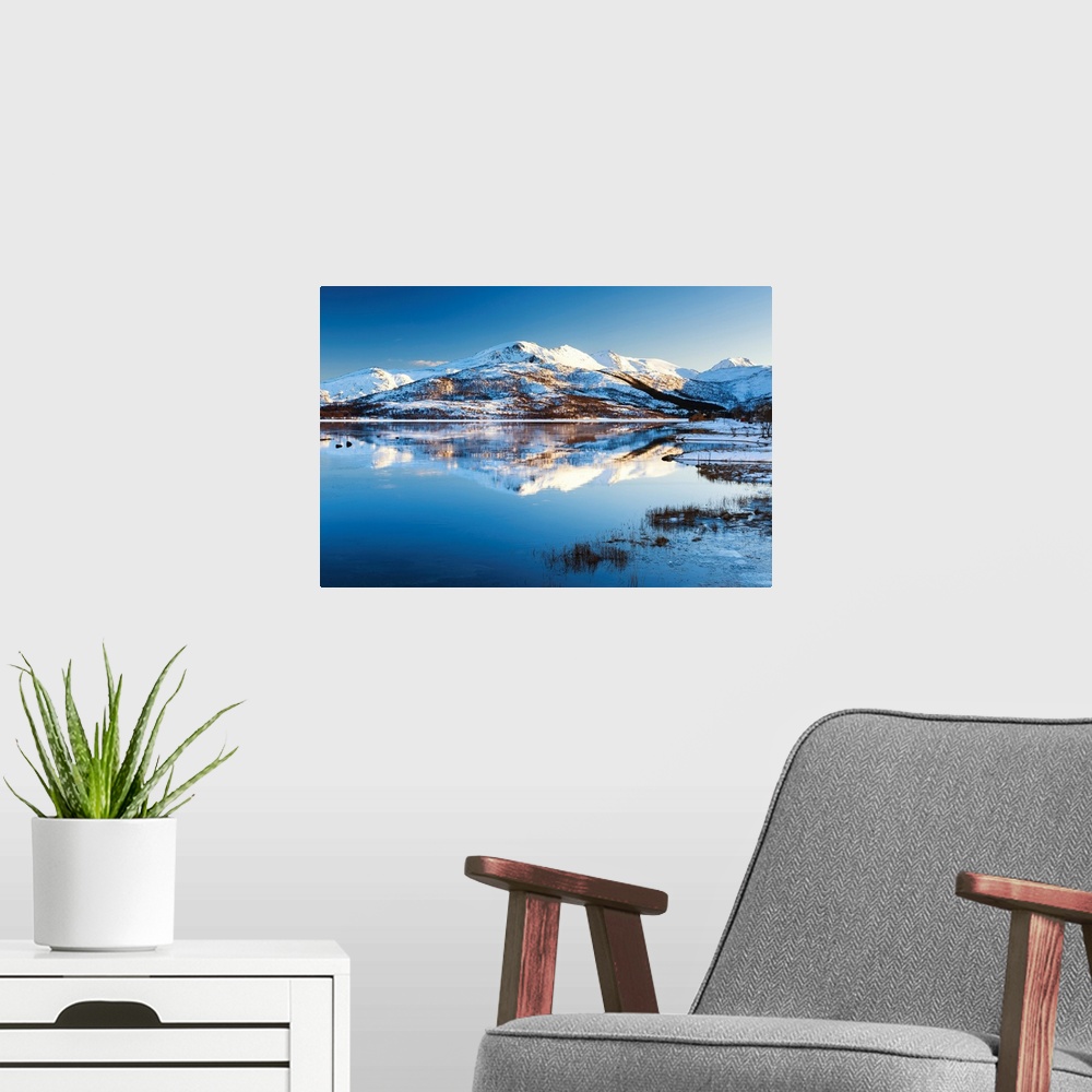 A modern room featuring Alstadpollen Reflections, Lofoten Islands, Norway