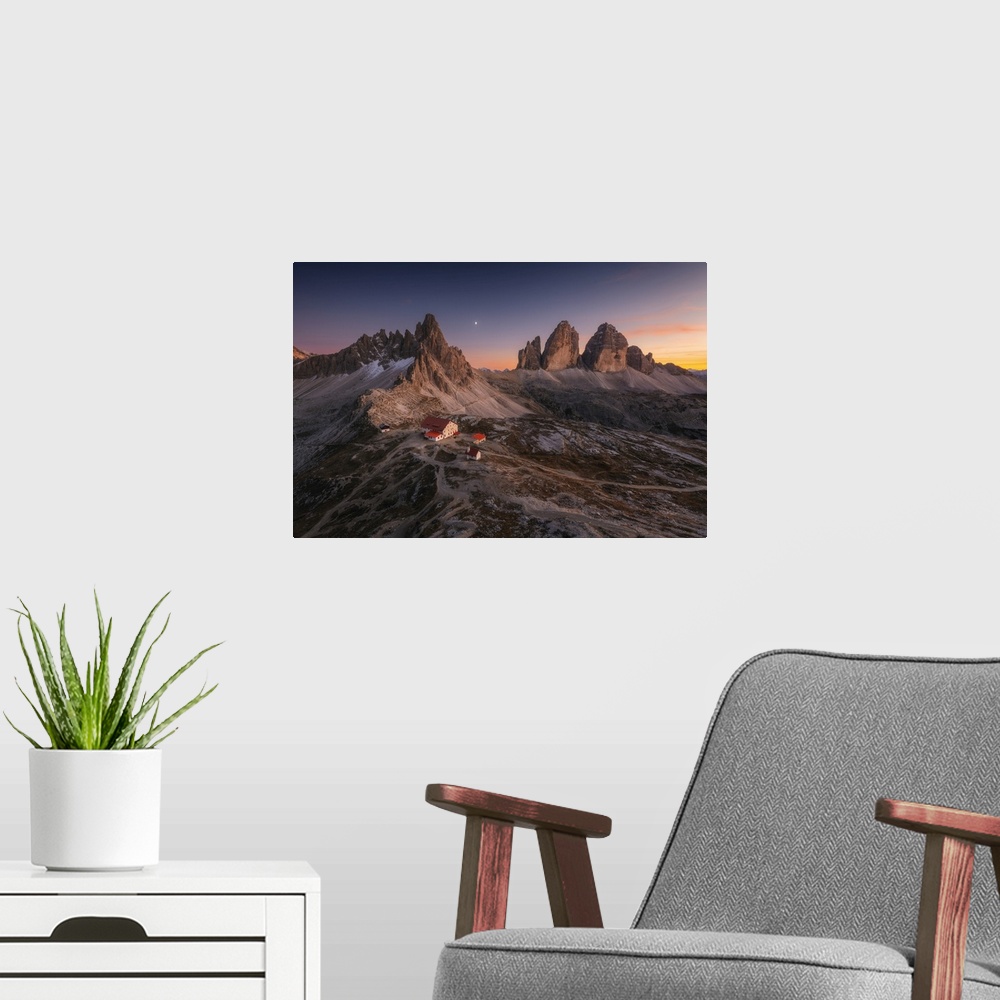 A modern room featuring An early autumn sunset over the Locatelli Hut, Monte Paterno and Tre Cime di Lavaredo, Dolomites,...