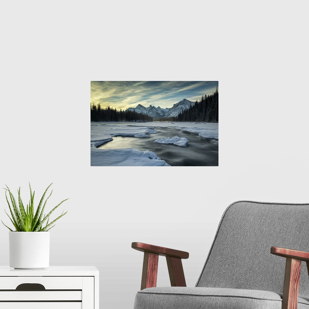 A modern room featuring Athabasca River in Winter, Alberta, Canada.
