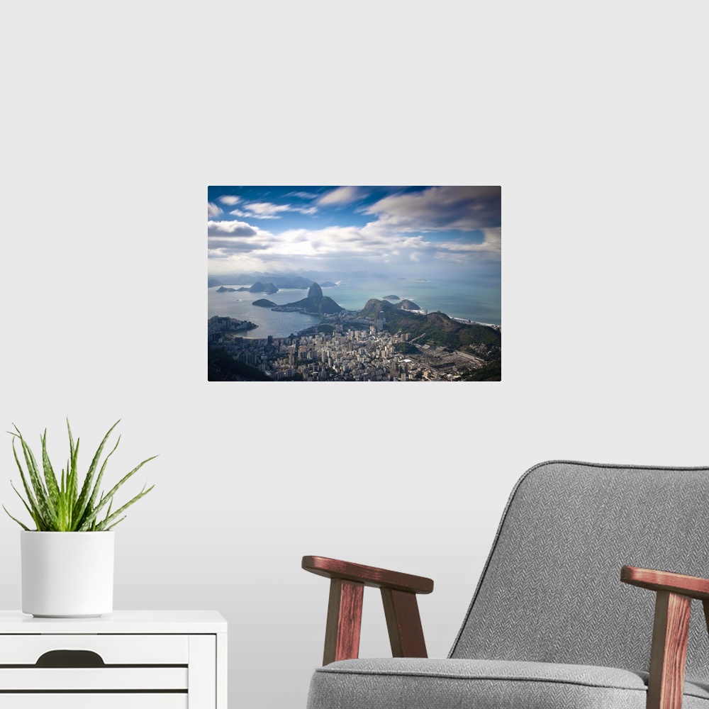 A modern room featuring Brazil, Rio De Janeiro, Cosme Velho, View of Sugar Loaf mountain, Botafogo Bay and Copacabana  fr...