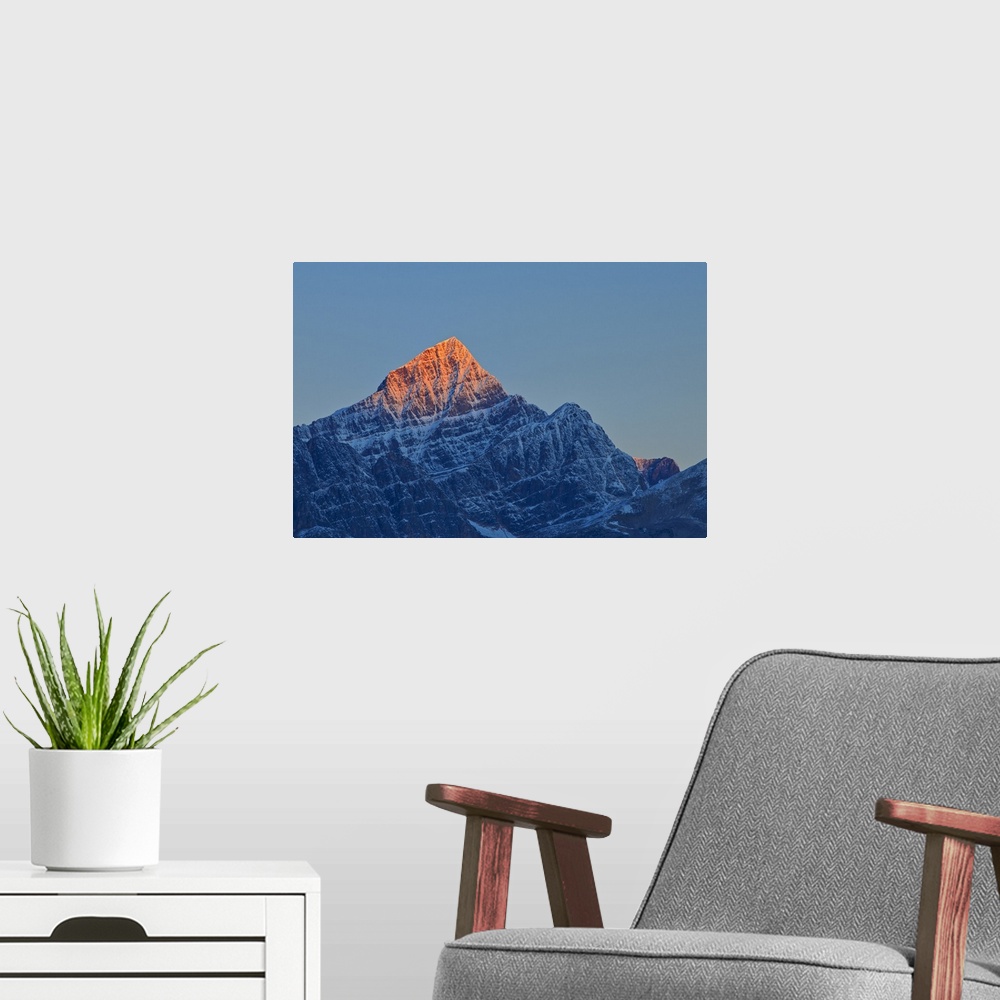 A modern room featuring First light on a peak of the Canadina Rocky Mountains, Icefields Parkway, Jasper National Park, A...