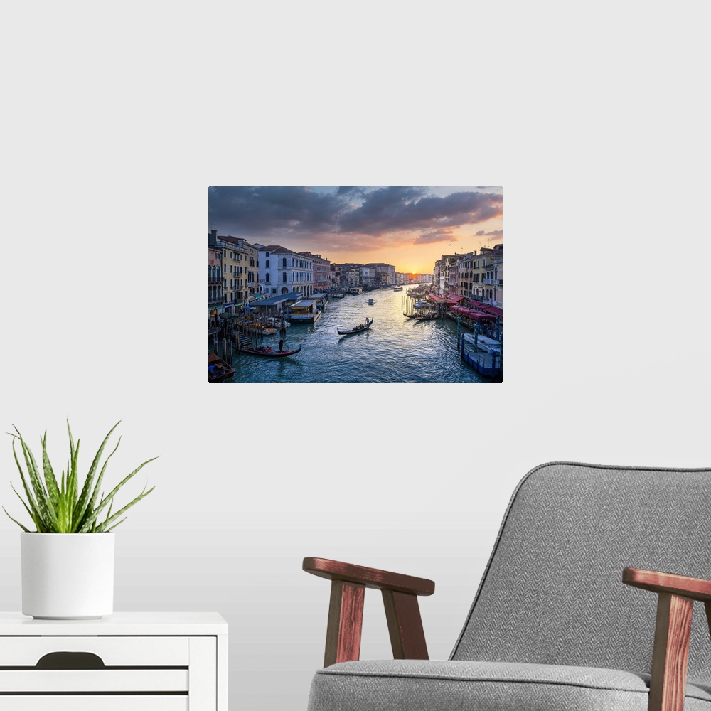 A modern room featuring Canal grande at sunset near Rialto Bridge, Venice, Veneto, Italy.