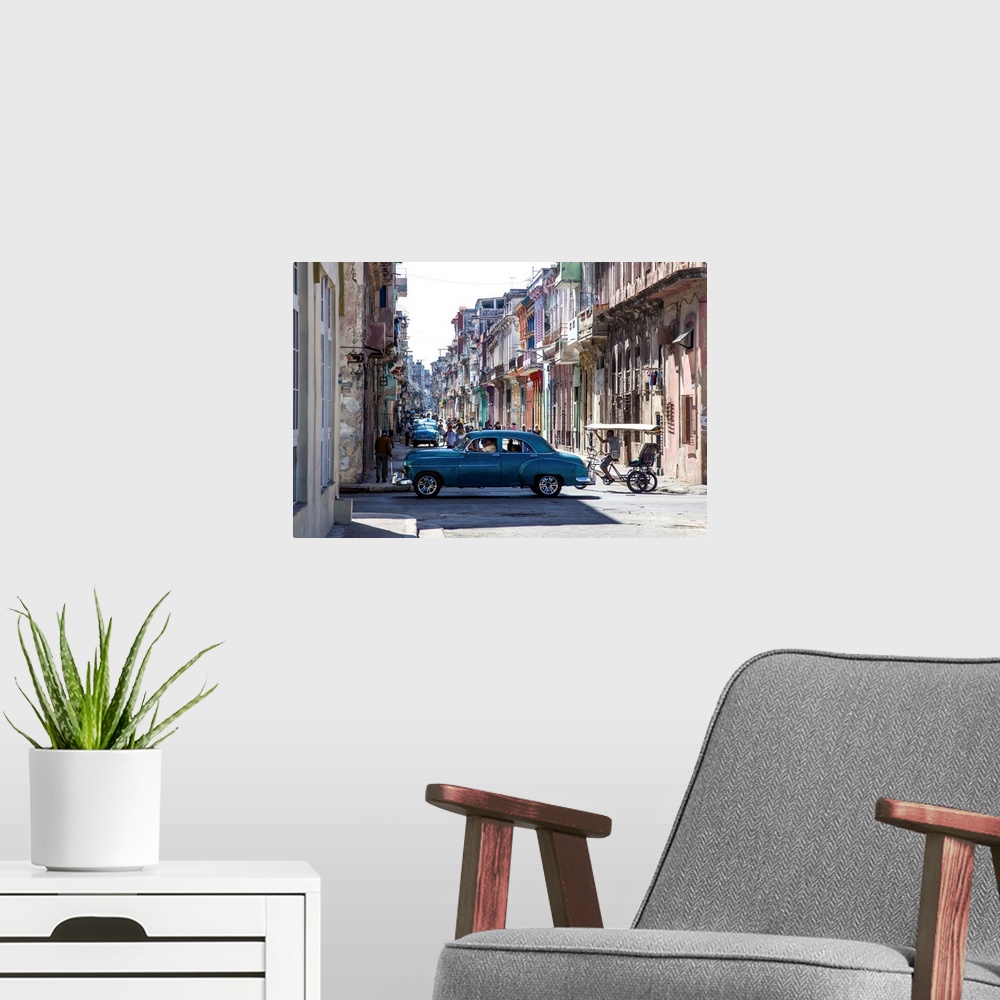 A modern room featuring Classic 50s america car in the streets of Centro Habana, Havana, Cuba.
