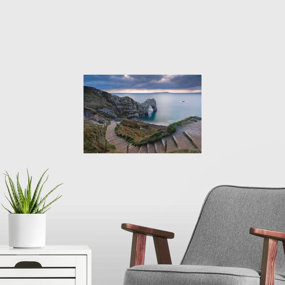 A modern room featuring Winding coastpath steps leading down to Durdle Door on the Jurassic Coast, Dorset, England. Autum...